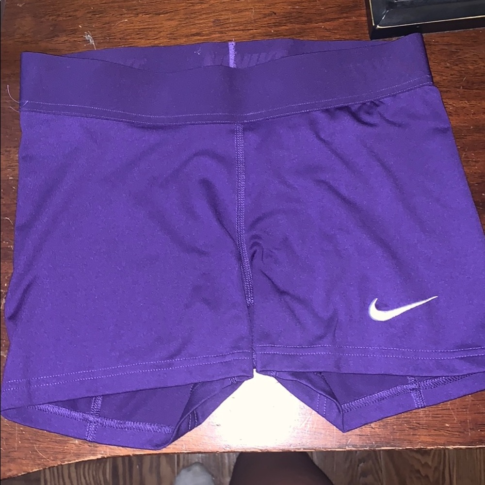 Purple Nike spandex shorts
